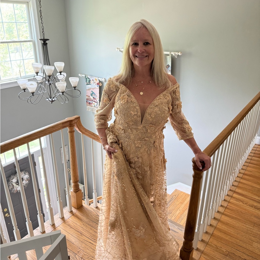 Jovani 06636 Floral Embroidery
Plunging Neck Dress - Picture 6 of 7
